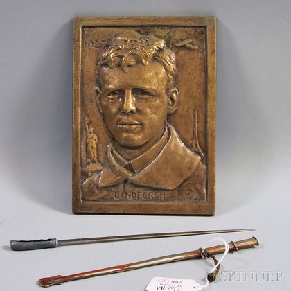 Commemorative Charles Lindbergh Bronze Portrait Plaque and a Miniature Metal Sword with Scabbard Letter Opener