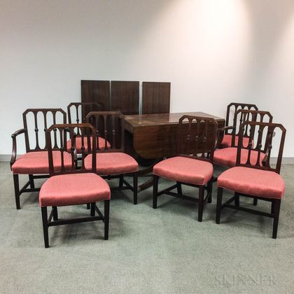 Classical-style Carved and Inlaid Mahogany Dining Table and a Set of Eight Federal-style Mahogany Chairs. Estimate $600-800