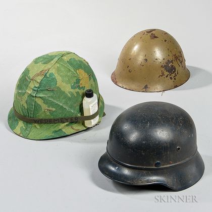 Three 20th Century Military Helmets