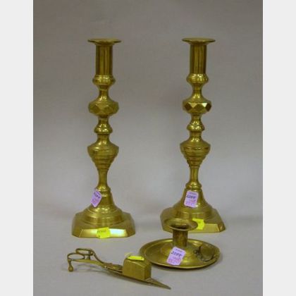 Pair of English Brass Push-up Candlesticks, a Brass Chamberstick, and a Pair of Brass Wick Scissors. 