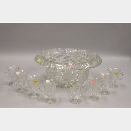 Colorless Cut Glass Punch Bowl with a Set of Eight Footed Punch Cups