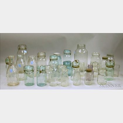 Seventeen Aqua and Colorless Glass Canning Jars and Eleven Assorted Milk and Dairy Bottles