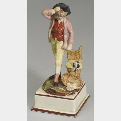 Pearlware Figure of a Man Wearing a Tricorner Hat