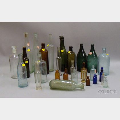 Twenty-eight Assorted Colored and Colorless Glass Bottles