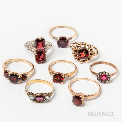 Eight Gold and Garnet Rings