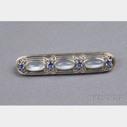 Louis Comfort TIffany Moonstone and Sapphire Brooch. c.1910 Photo Courtesy  of Christie's. – Antique Jewelry University