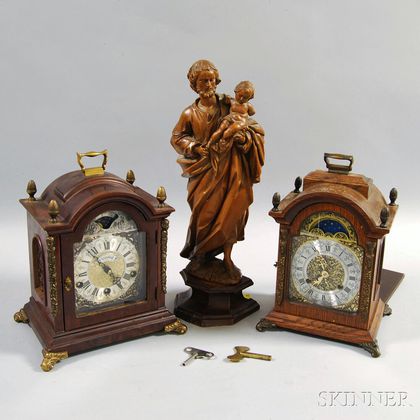 Two Clocks and a Wood Carving