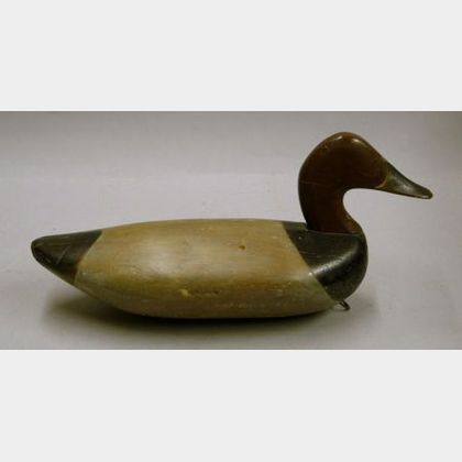 Carved and Painted Wooden Canvasback Decoy. 