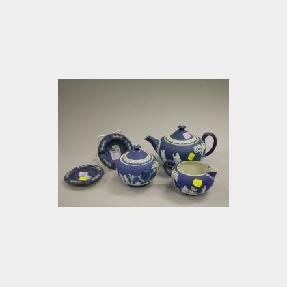 Wedgwood Dark Blue Jasper Three-Piece Tea Set and Two Ashtrays. 