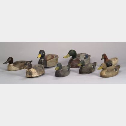 Eight Assorted Carved and Painted Wooden Duck Decoys