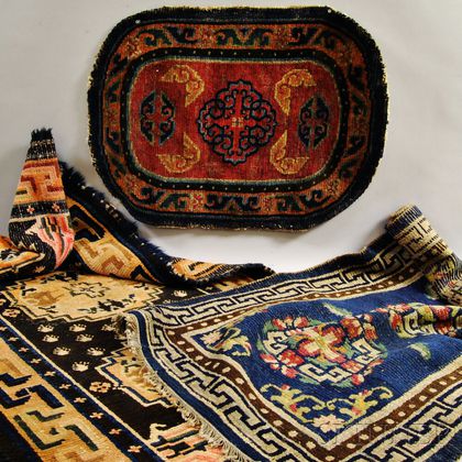 Two Tibetan Rugs and a Saddle Rug