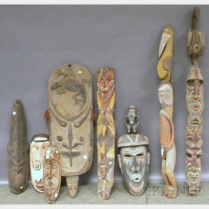 Eight Papua New Guinea Carved Wood Masks and Sculptures.