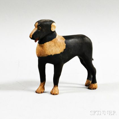 Black- and White-painted Carved Dog