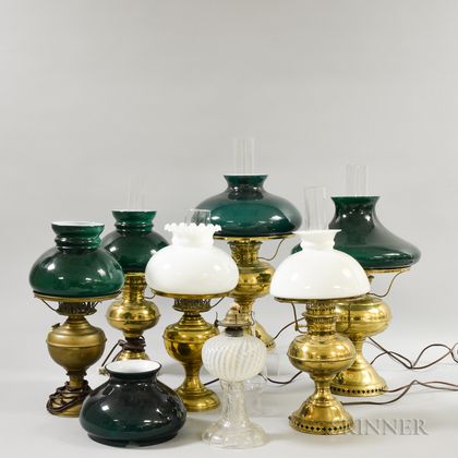 Six Brass Kerosene Lamps and a Pressed Glass Lamp. Estimate $100-200