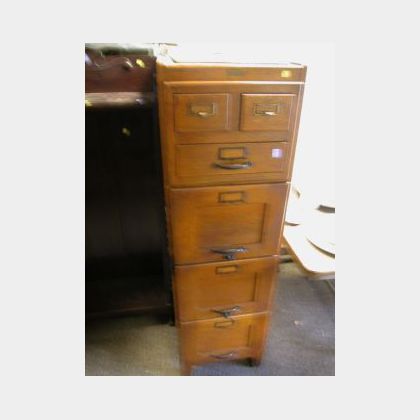 Leven Co. Oak Six-Drawer File Cabinet. 