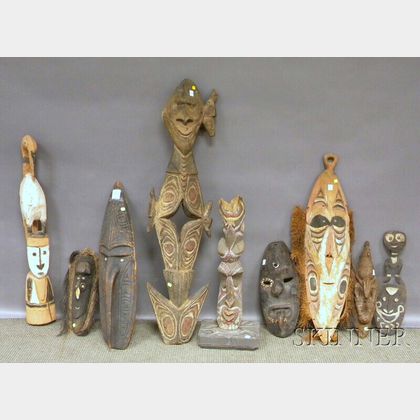 Nine Papua New Guinea Carved Wood Masks and Sculptures.