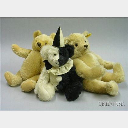 Two Steiff Yellow Mohair Teddy Bears and a Black and White Mohair Clown Bear