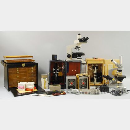 Four Modern Microscopes and Accessories