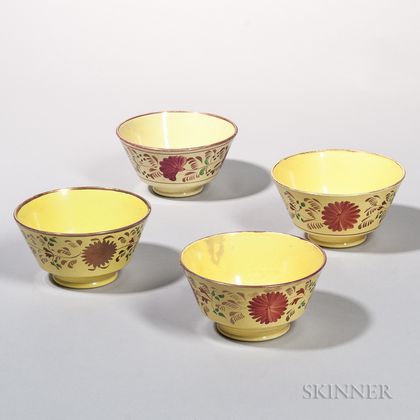 Four London-form Yellow-glazed and Luster-decorated Earthenware Bowls