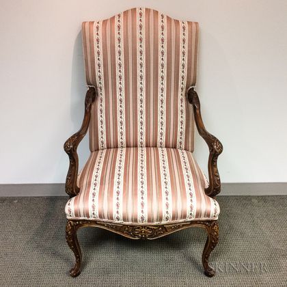 French Provincial-style Carved and Upholstered Walnut Fauteuil