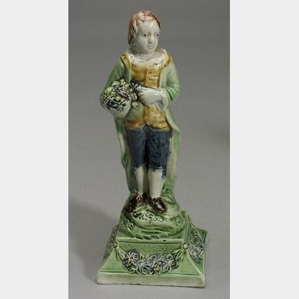 Staffordshire Lead Glazed Creamware Figure of a Boy