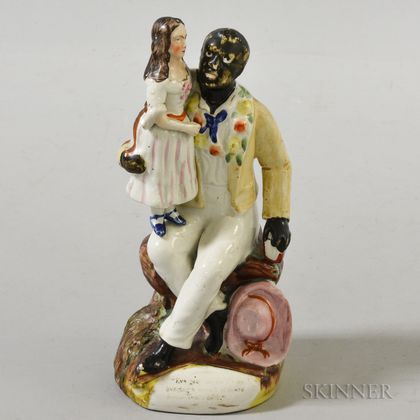 Staffordshire "Uncle Tom" Figure