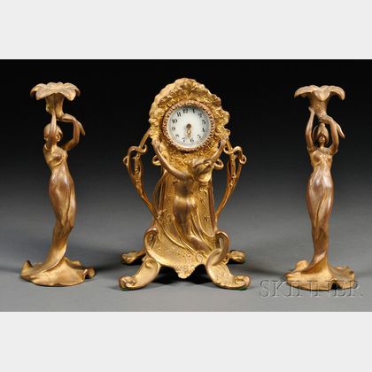 New Haven Clock Co. Art Nouveau Gilt-metal Figural Table Clock and a Pair of Candlesticks