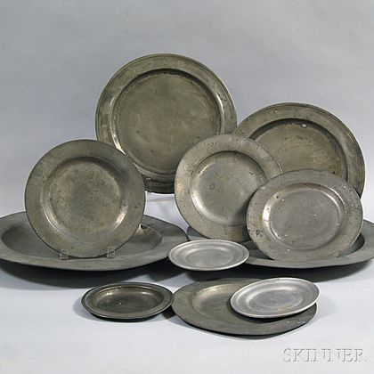 Eleven Pewter Plates and Chargers