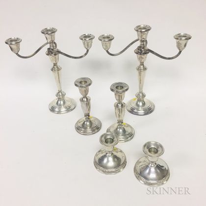 Three Pairs of Sterling Silver Weighted Candlesticks