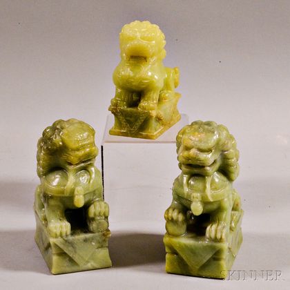Three Carvings of Seated Lions