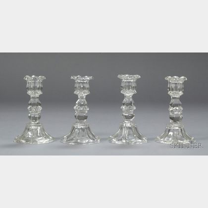 Two Pairs of Colorless Petal and Loop Glass Candlesticks