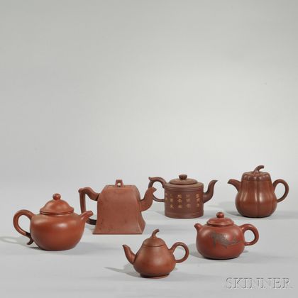 Six Yixing Covered Teapots