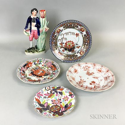 Three English Ceramic Plates, a Chinese Export Porcelain Plate, and a Staffordshire Cottage Figure. Estimate $100-150