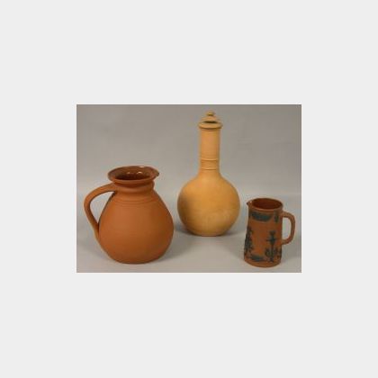 Wedgwood Rosso Antico Lidded Bottle and Two Jugs. 