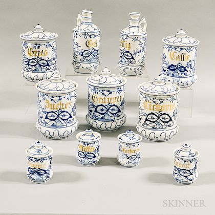 Set of Eleven Blue and White Ceramic Canisters and Cruets. Estimate $200-300