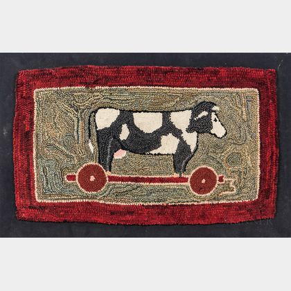 Hooked Rug Depicting a Cow Pull-toy