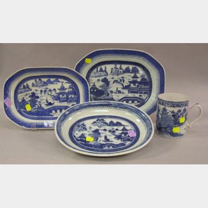 Chinese Export Porcelain Blue and White Decorated Serving Bowl, Mug, and Two Platters. 