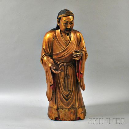 Red-lacquered and Giltwood Temple Figure