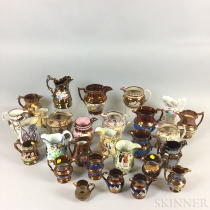 Approximately Thirty-two Mostly Copper Lustre Jugs and Pitchers