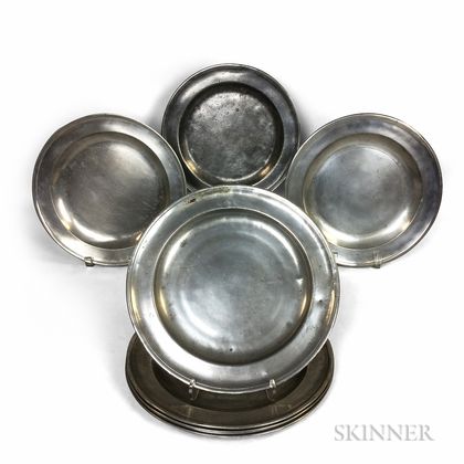 Eight English Pewter Chargers