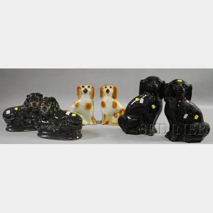 Three Pairs of Staffordshire-style Spaniels and Lions