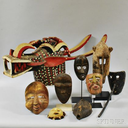 Nine Tribal Carved Masks