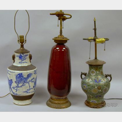 Chinese Champleve Lamp, a Metal-mounted Sang de Boeuf Glazed Ceramic Vase/Table Lamp, and a Chinese Blue and Wh... 