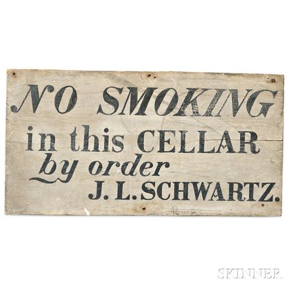Painted "NO SMOKING in this CELLAR by order J.L. SCHWARTZ.,"