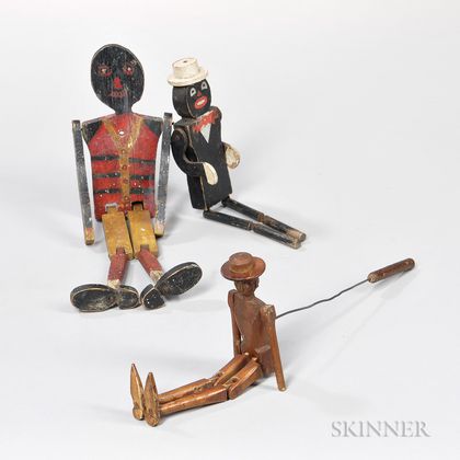 Three Carved and Painted Articulated Dancing Figures. Estimate $200-300