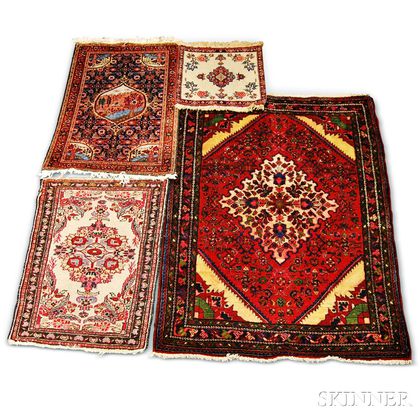 Four Oriental Small Rugs