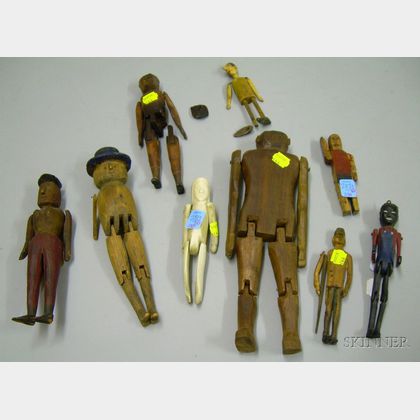 Eight Carved Wood Articulated Figures and an Inuit Carved Bone Articulated Figure. 