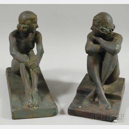 American School, 20th Century Pair of Plaster Bookends of Seated Female Nudes.