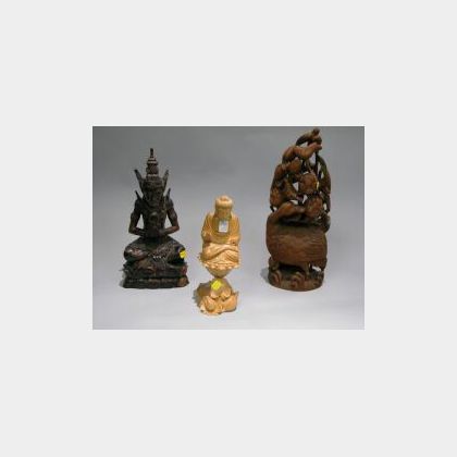 Three Asian Carved Wood Figures. 