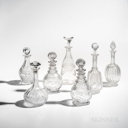 Seven Cut Glass Decanters with Stoppers